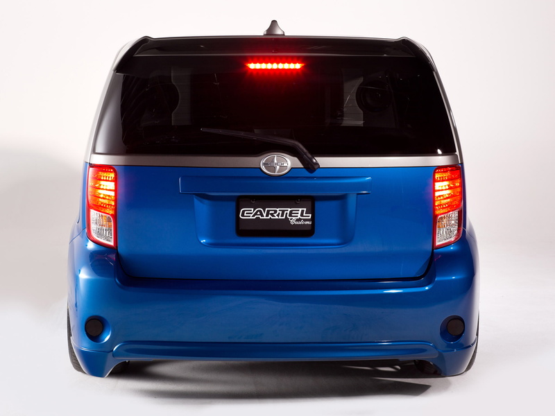 cartel, western script, red, car, 2014, scion, single object, studio shot, business, limousine, blue, mode of transportation, land vehicle, city, no people