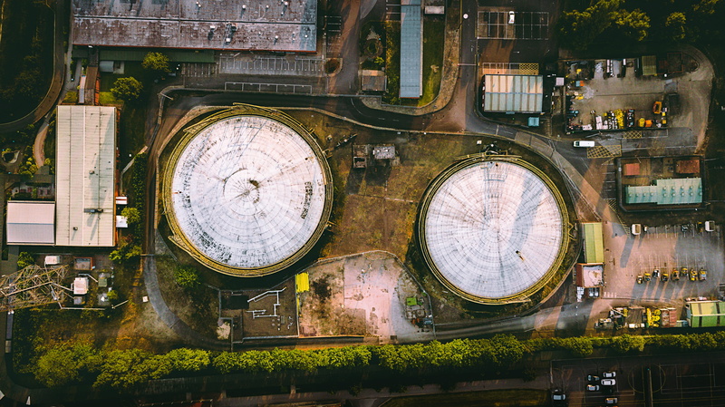 neighborhood, clock, industrial, spire, building exterior, sundial, landscape, aerial view, high angle view, no people, time, urban, built structure, tourism