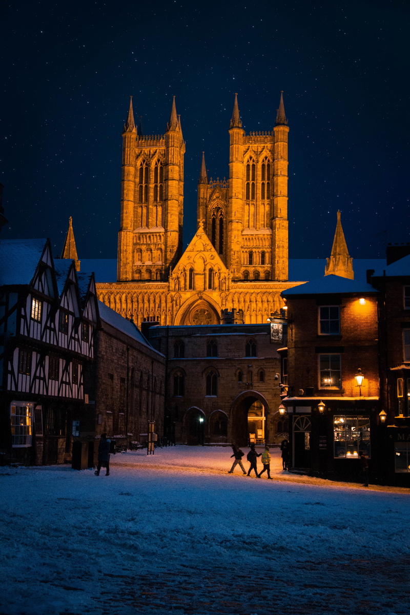 illuminated, time, building, blue, spirituality, christmas, building exterior, castle, star, lincoln, cold, religion, orange, outdoors, place of worship