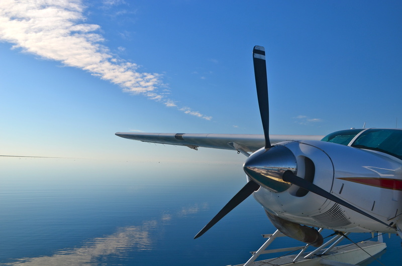 flying, airport, water, mode of Transport, ocean, blue, commercial Airplane, aircraft Wing, plane, airport runway, paradise, transportation, air, sky, day