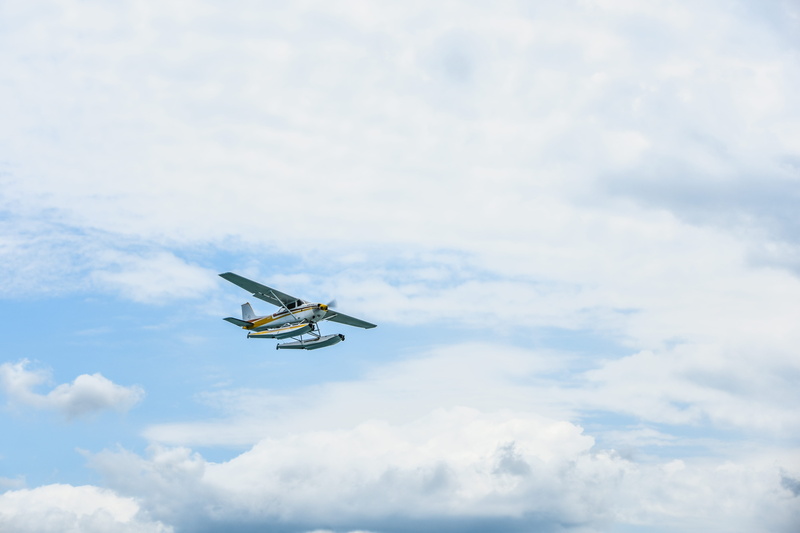 fly, sky, water, mode of transportation, low angle view, 5K, white color, flight, airplane, daytime, seaplane, transportation, cloud - sky, mid-air, air vehicle