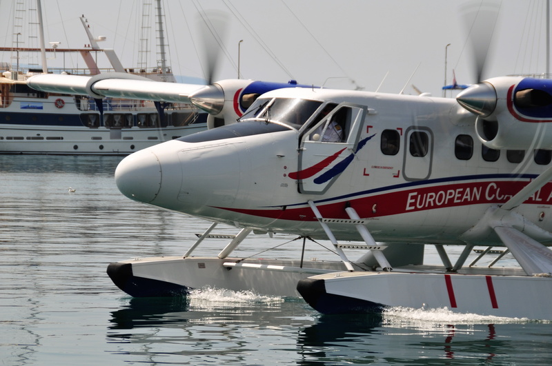 white, red, harbor, airplane, reflection, wings, nature, yacht, aircraft, pier, luxury, nautical vessel, day, sea, paint, ship, waterfront, motor, landing
