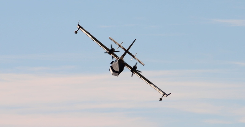 airshow, mode of transportation, airplane, fire fighting, fighter plane, above, transportation, outdoors, mission aircraft, nature, air vehicle, on the move