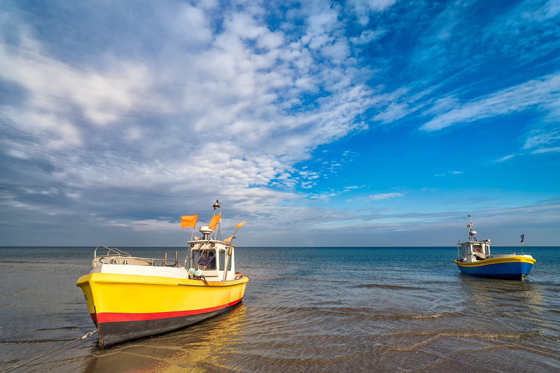 nobody, fishing boats, recreational boat, ocean, boat, sky, tranquility, shore, mode of transport, sea, seascape, yellow, nature, tourism, travel destinations