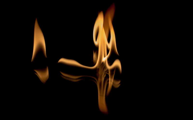 no people, brand, fireplace, black color, burning, black background, indoors, religion, nature, motion, spirituality, fire, heat - temperature, 4K, glowing