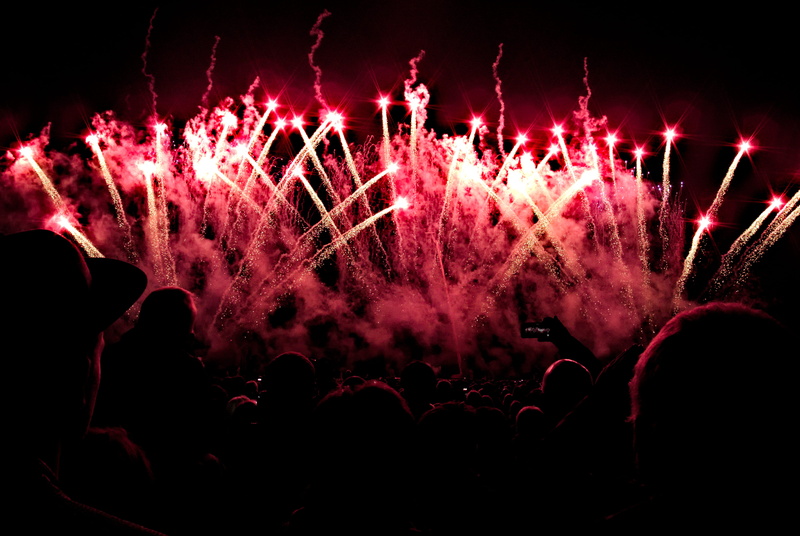 large group of people, crowd, arms raised, illuminated, blurred motion, light, human limb, fireworks, festival, human body part, arts culture and entertainment