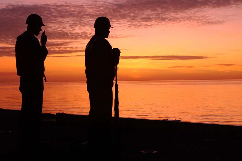 two people, couple - relationship, sea, scenics - nature, navy, ship, silhouettes, stand watch, tranquil scene, orange color, silhouette, horizon over water