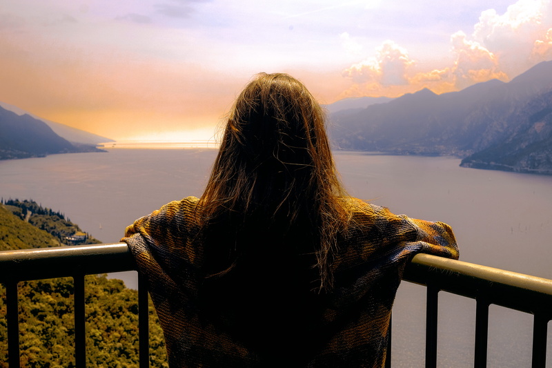 women, nature, leisure activity, hair, lake, sky, landscape, warm clothing, real people, 4K, rear view, lifestyles, sea, clouds, italy, beautiful, water