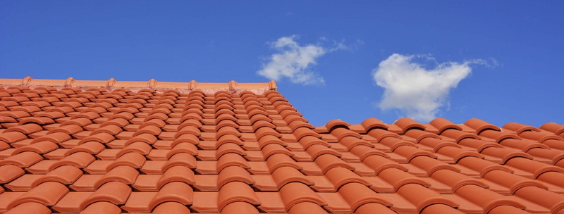 building, sonoran peak, built structure, pattern, day, damage, roofing, outdoors, work, low angle view, architecture, blue, sonoran, city, brown, no people