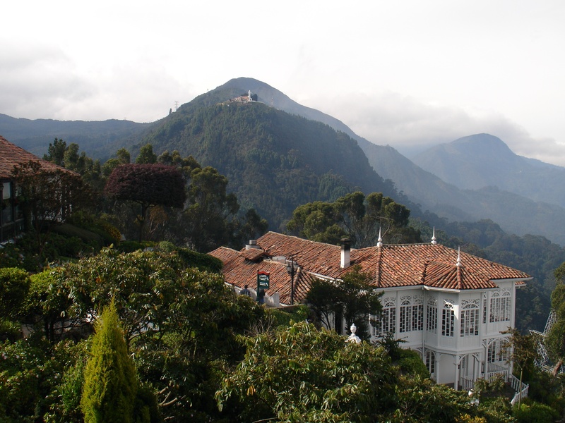 beauty in nature, mountain, architecture, sky, brown, no people, cloud - sky, monserrate, guadalupe, large, high angle view, residential district, forest