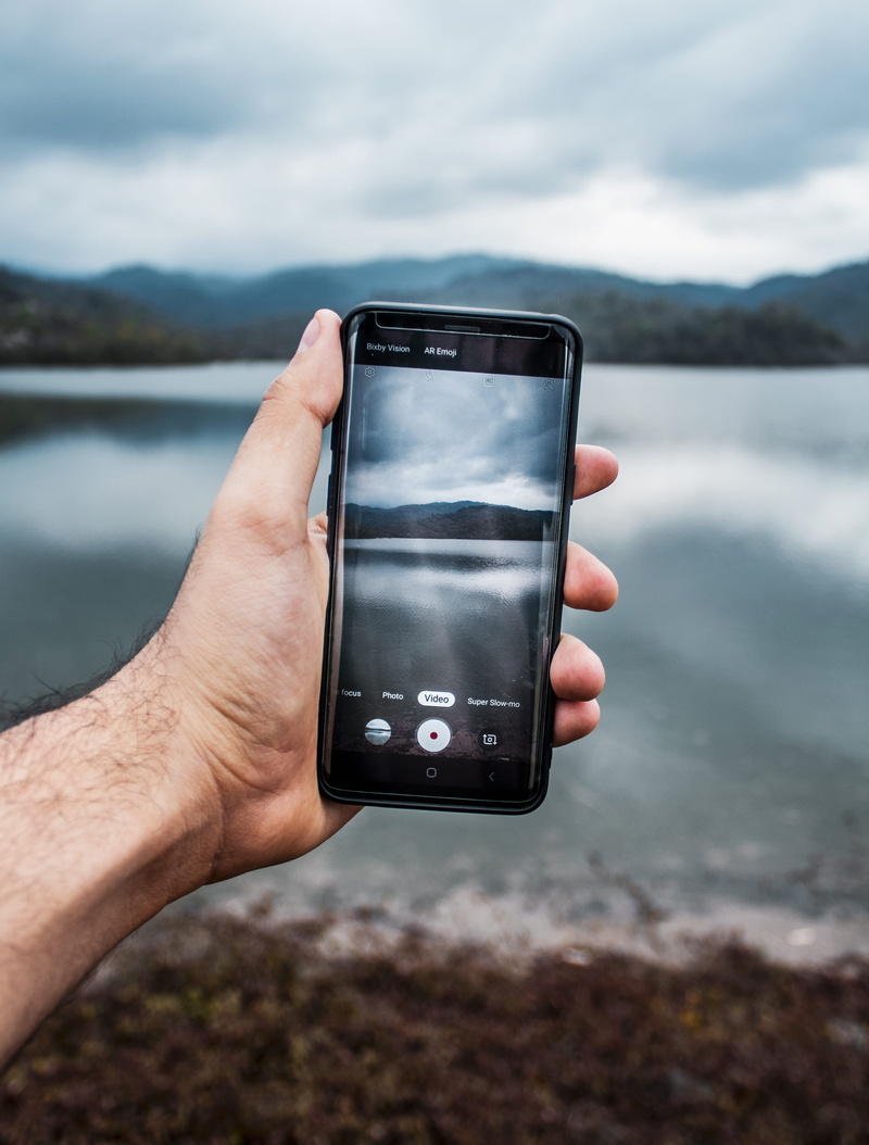 real people, smartphone, wireless technology, lake, day, one person, 4K, focus on foreground, phone, finger, photographing, landscape, tree, human, photography themes