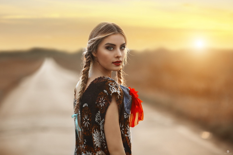 real people, blonde, portrait, adult, young adult, outdoors, beauty, fashion, lifestyles, one person, looking back, sky, hairstyle, sunset, braids, focus on foreground