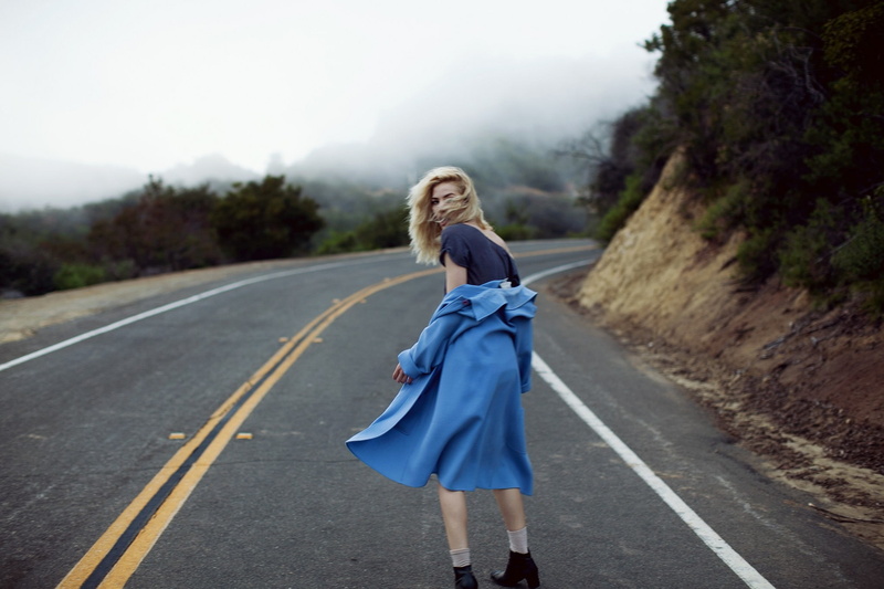 road, looking back, looking over shoulder, 1080P, hair in face, blonde, blue coat, women outdoors, windy, women, model