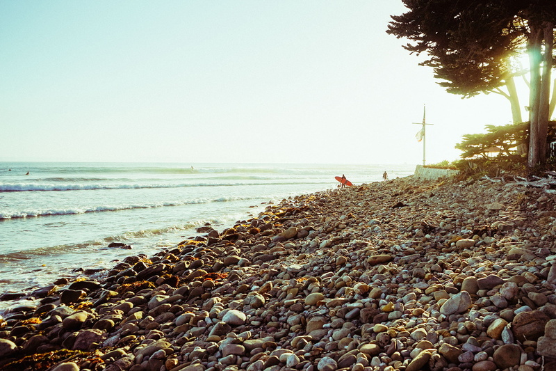 water, soil, one person, rock, photo, day, beach, waves, shore, solid, clear sky, tree, no people, sea, surfing, nature, sand, green, rock - object, peebles