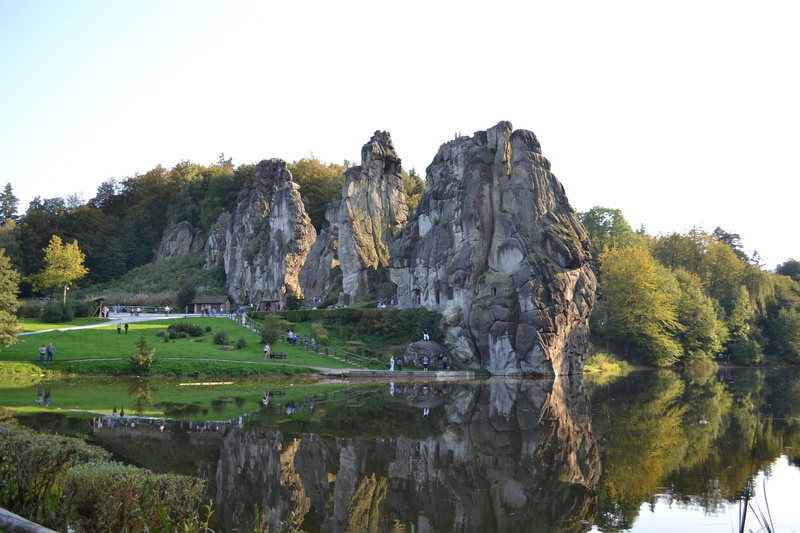 tranquil scene, growth, clear sky, Rock, Externsteine, beauty in nature, Nature, non-urban scene, sky, cliff, no people, lake, reflection, formation, tranquility