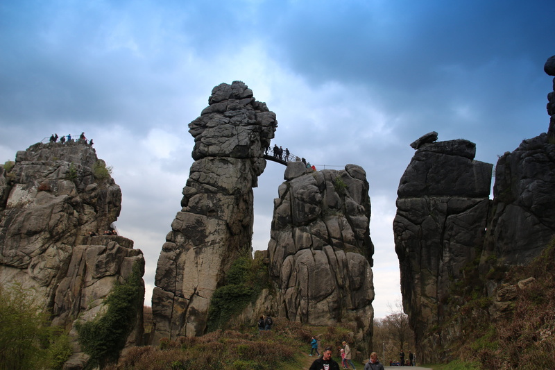 tranquil scene, teutoburg forest, solid, externsteine, non-urban scene, physical geography, travel, mountain, group of people, cloud - sky, activity, 5K