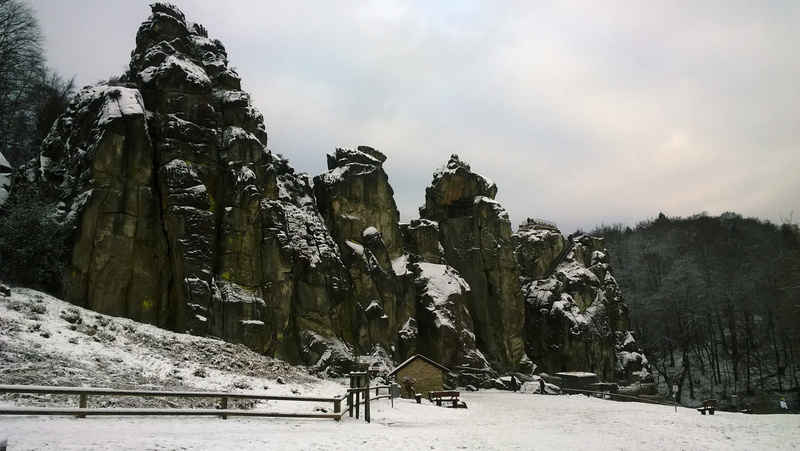 travel destinations, externsteine, architecture, stone formation, cold temperature, plant, winter, outdoors, sky, mystical, tree, no people, forest, distant view
