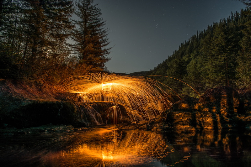 beauty in nature, fog, lighted, sitting on rock, outdoors, tranquility, plant, steel, photo, nature, near, water, body, star - space, forest, wall, wire wool