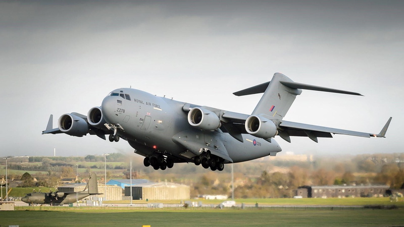 sky, airport runway, mid-air, airplane, flying, air vehicle, royal air force, transportation, plane, day, motion, air force, airport, military, propeller