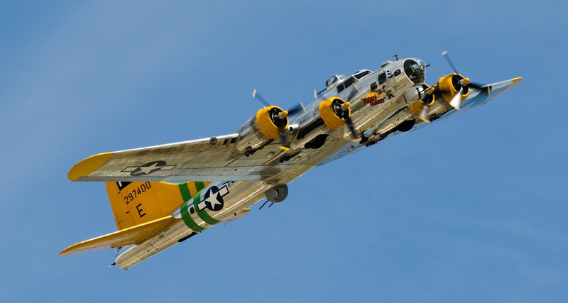outdoors, military airplane, mode of transportation, antique, bomber, navy, yellow, no people, flying, The " flying fortress", nature, Flying Fortress
