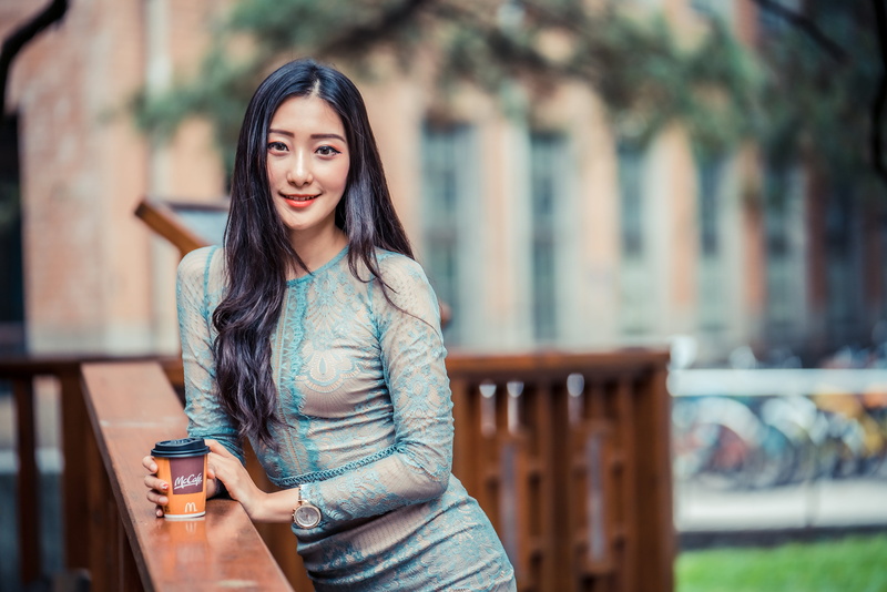 depth of field, long hair, blue dress, house, brunette, 4K, railing, coffee cup, model, trees, women, Asian, looking at viewer, grass, bycicle, wristwatch
