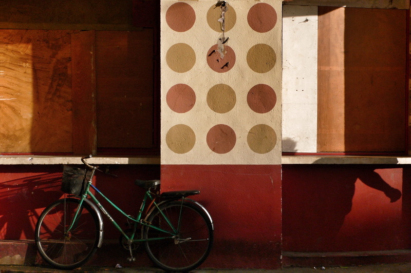 saigon, red, asia, wheel, bycicle, stationary, pattern, wall, sunlight, mode of transportation, yellow, no people, nature, day, transportation, art and craft