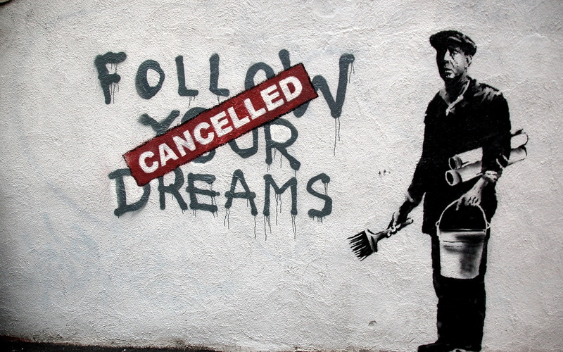 human representation, western script, people, day, lifestyles, cancelled, clothing, casual clothing, text, banksy, wall - building feature, male likeness
