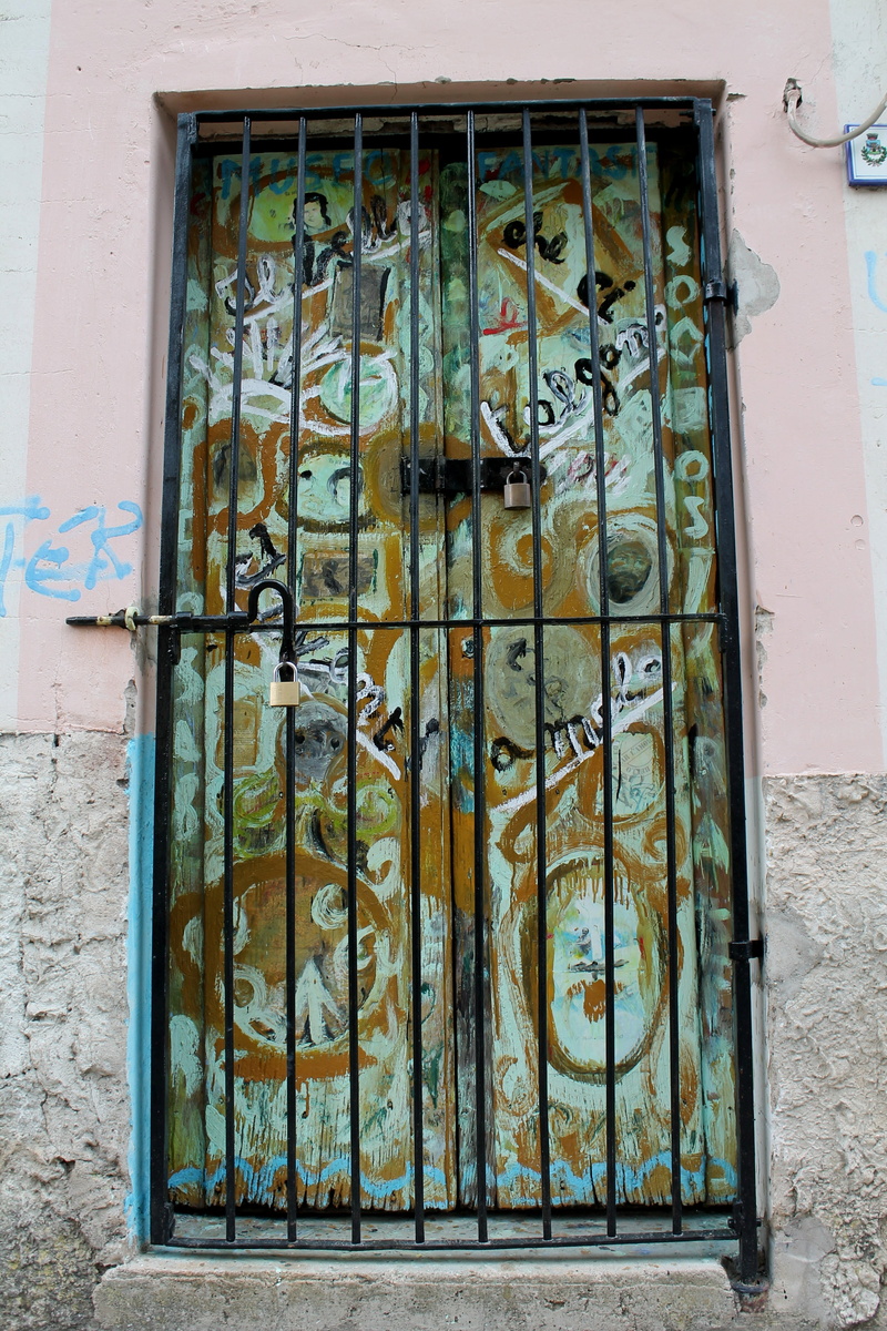 graffiti, window, weathered, cancelled, house, decoration, architecture, entrance, safety, outdoors, wall - building feature, day, wall, decorated door
