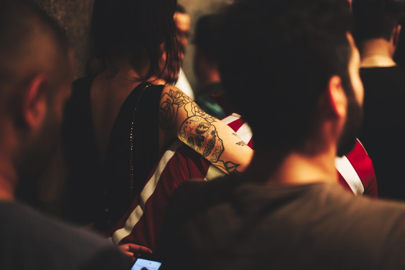 real people, group, men, adults, wearing, selective focus, indoors, group of people, youth culture, concert, lifestyles, 5K, man, dark, young men, adult