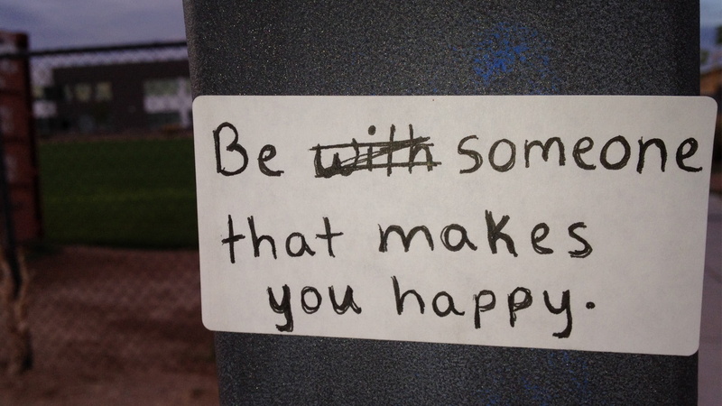 western script, outdoors, happy, focus on foreground, sign, someone, no people, emotion, message, information, communication, guidance, quote, art and craft