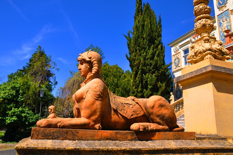 blue, history, pecs, sky, built structure, representation, human representation, no people, tree, spirituality, day, male likeness, hungary, building exterior