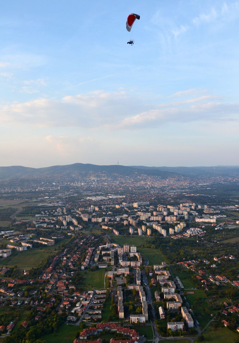 high angle view, travel destinations, crowd, mid-air, flying, Pecs, building, day, sky, cityscape, nature, Paragliding, built structure, architecture, buildings