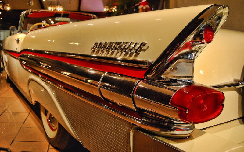 still life, close-up, motor vehicle, red, vehicle, text, car, no people, table, mode of transportation, land vehicle, retro styled, indoors, food and drink