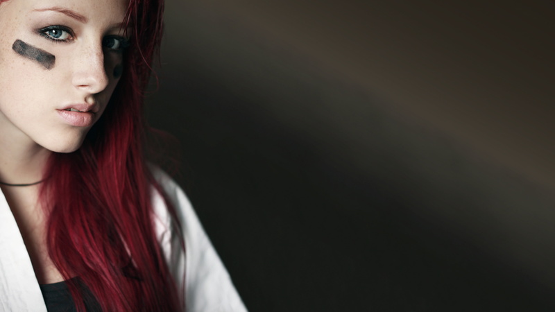human face, black clothing, face paint, white, looking at viewer, studio shot, jacket, portrait, one person, 8K, black background, women, copy space, dyed red hair