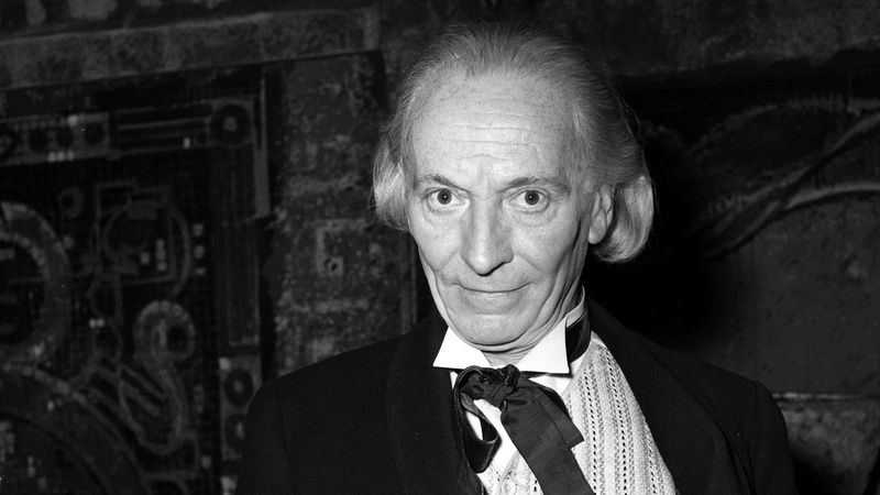 mature adult, focus on foreground, suit, black, looking at camera, men, gray hair, portrait, senior women, William Hartnell, front view, real people, adult