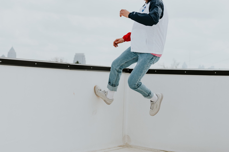 sky, white, architecture, full length, atl, built structure, day, lifestyles, outdoors, mid-air, faceless, jump, balance, parkour, ked, jumping, roof, wall - building feature