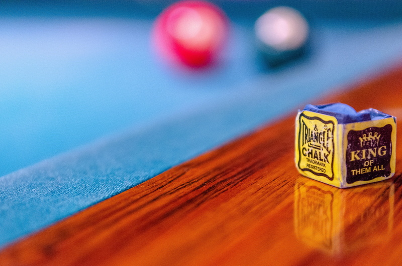 finance, tail, western script, no people, ball, leisure games, red, snooker, indoors, wood - material, carpet, currency, focus on foreground, still life