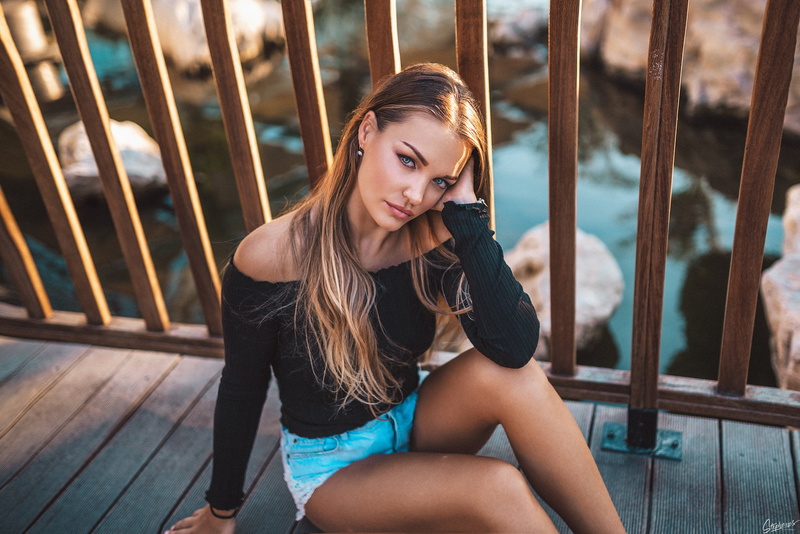 sunlight, bridge, brunette, women outdoors, women, Stephanos Georgiou, straight hair, portrait, bokeh, depth of field, blue eyes, bare shoulders, looking at viewer