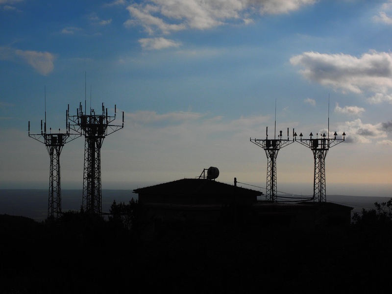 tower, cloud - sky, cell towers, tree, connection, radar equipment, low angle view, construction equipment, power supply, architecture, no people, sunset