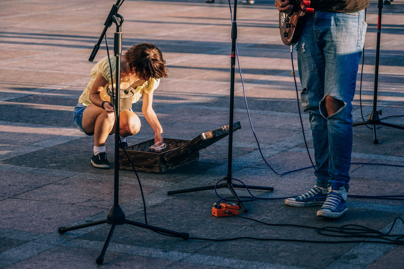 full length, person, crouching, energy, hobby, musical, front, music, playing, holding, hairstyle, people, lifestyle, performance, sitting, adult, two people