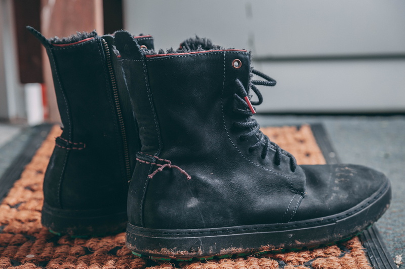 absence, footwear, shoelace, bag, black, lace tie, rubberize, area, outdoors, classic, boot, hiking, leather, textile, muddy, clothing, rug, wear, winter boots
