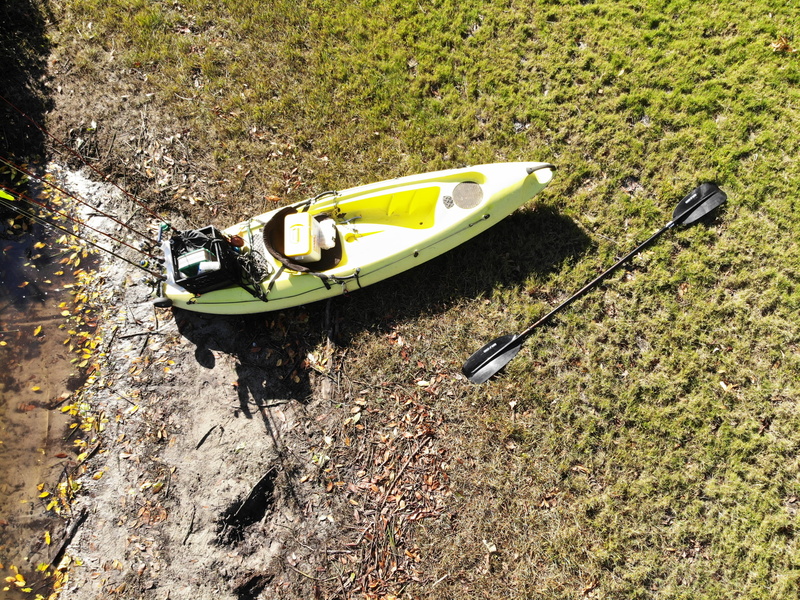 canoe, apparel, motor vehicle, hovercraft, boat, no people, green color, dinghy, vehicle, clothing, day, outrigger, oldsmar, abandoned, oars, water, high angle view