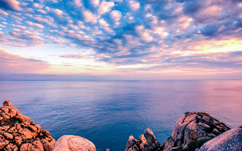 sunset, sea, sky, solid, water, tranquility, beauty in nature, island, coast, rock - object, horizon over water, rock, outdoors, dongji, tranquil scene