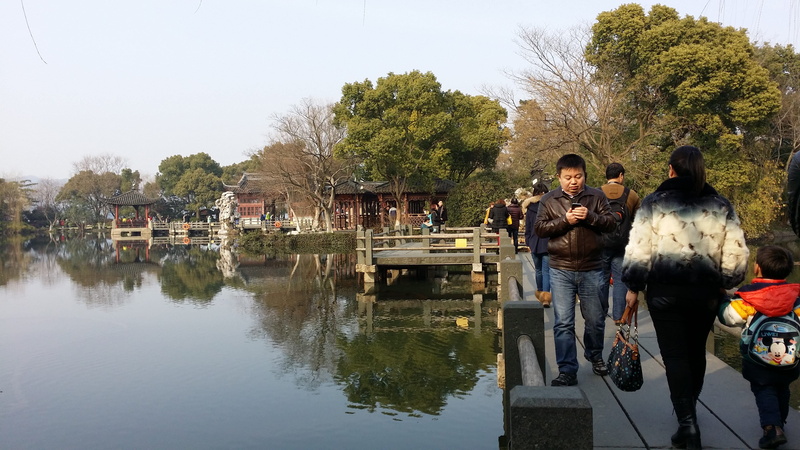 built structure, leisure activity, reflection, sky, real people, xihu, building exterior, women, relax, hangzhou, nature, tree, people, lake, adult, lifestyles