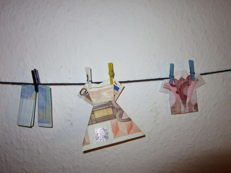 ceiling, pattern, tie, religion, rope, clothespin, clothesline, variation, frame, money, clothing, still life, trousers, money laundry, close-up, multi colored