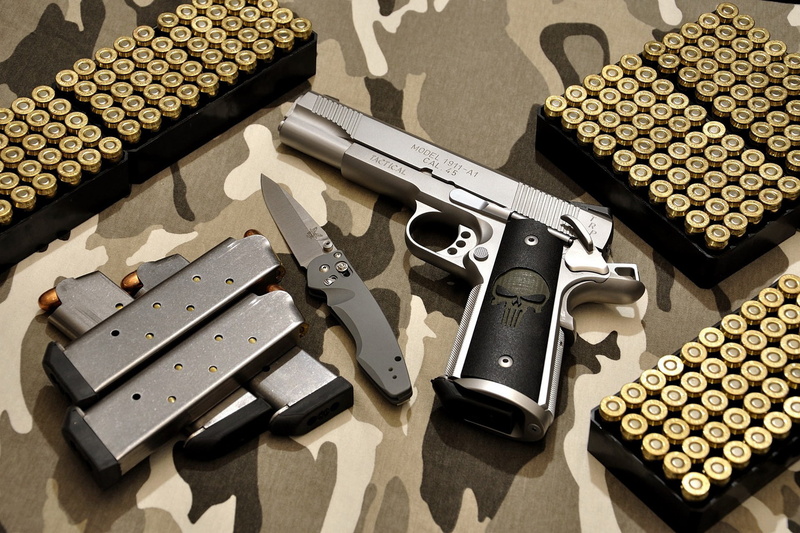 military, close-up, social issues, security, 1911, violence, single Object, army, high angle view, weapon, old-fashioned, aggression, metal, sunlight, handgun