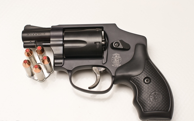 still life, security, warning sign, crime, no people, automatic, handgun, aggression, 2K, white background, smith and wesson 38 special revolver, studio shot