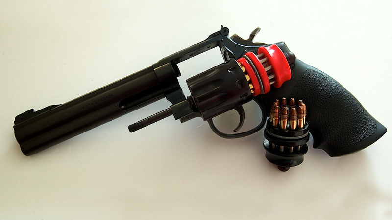 drum, violence, pistol, security, warning sign, safety, weapon, communication, cartridges, 1080P, indoors, black color, close-up, gun, black, no people