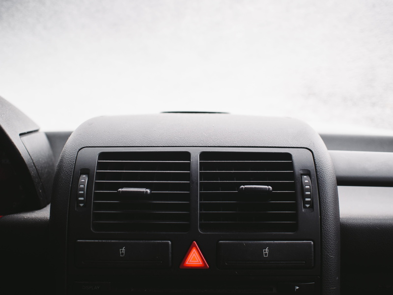 no people, indoors, focus on foreground, Car, equipment, Windshield, day, transportation, mode of transportation, control panel, Dashboard, air, black color