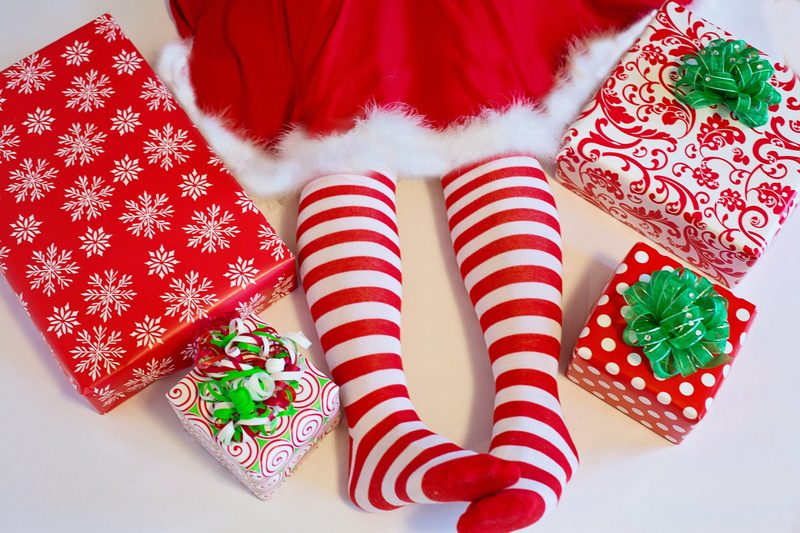 december, festive, clothing, floral pattern, person, 5K, shoe, lifestyles, human body part, high angle view, standing, holiday, socks, red, gifts, indoors